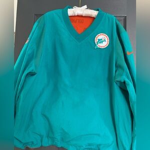Miami Dolphins pull over weatherproof Nike jacket.